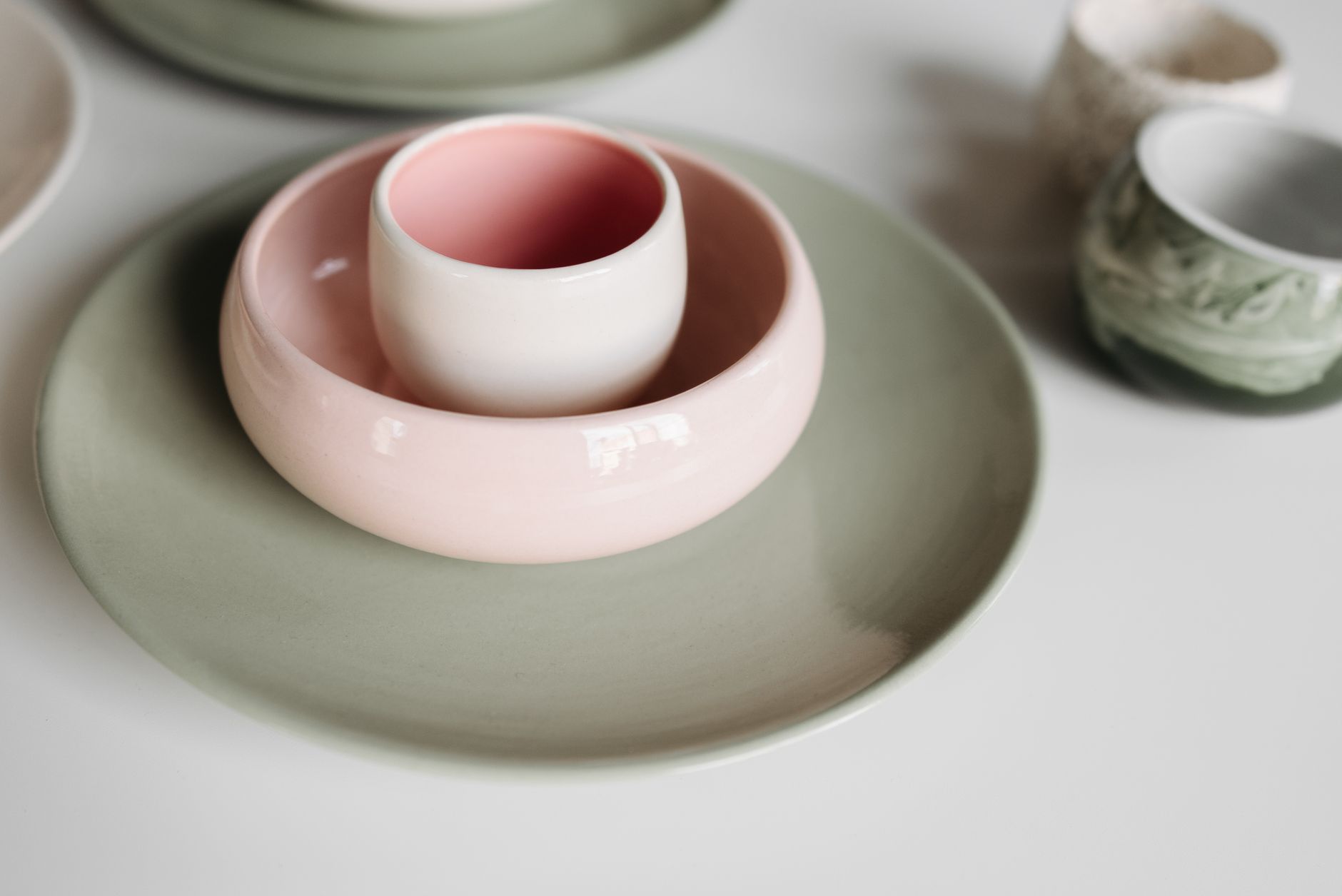 A custom set of handmade tableware on a table